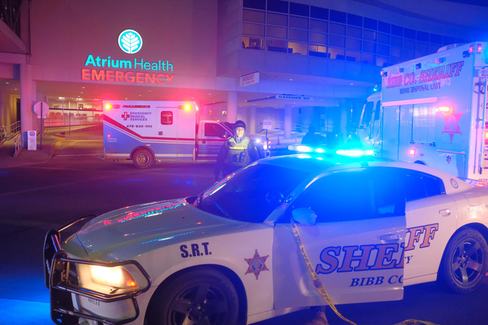 Law enforcement surrounds the entrance of Atrium Health Navicent in Macon, Ga. on Jan. 17, 2024. It is the only American College of Surgeons Committee on Trauma verified Level I trauma center in middle Georgia 