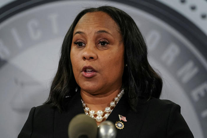 PBS NewsHour Fani Willis accuses a special prosecutor’s estranged wife of ‘interfering’ with Trump election case