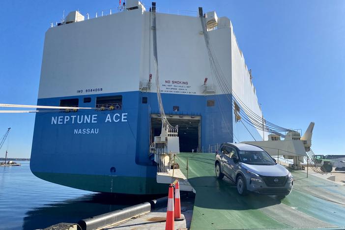 A Nissan Rogue exits the bay of the vehicle carrier Neptune Ace at the Port of Brunswick in Georgia.