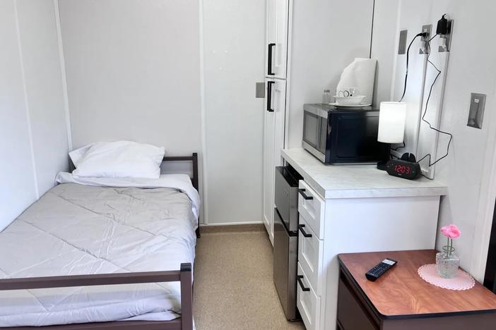 The 40 micro-units of Atlanta’s first rapid housing community for unhoused people includes a bed, kitchenette and bathroom. (Dyana Bagby)