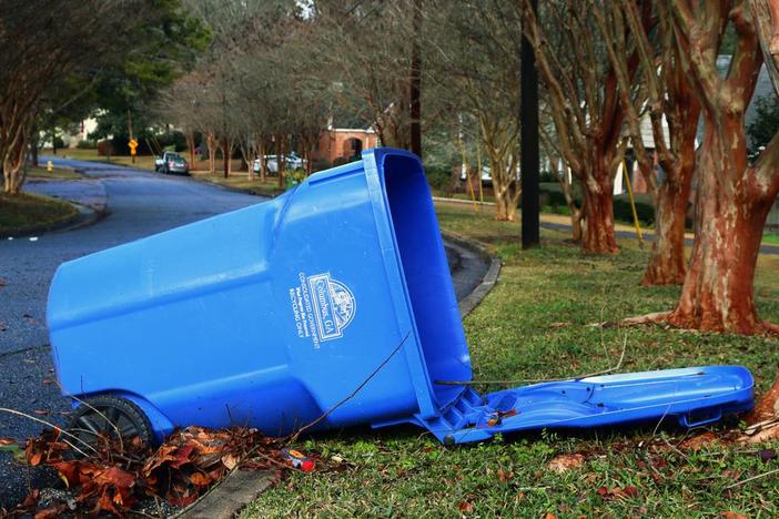 An empty blue recycling bin on Wildwood Avenue was knocked over from the recent storms moving through Columbus. 01/09/2024 Kala Hunter khunter@ledger-enquirer.com 