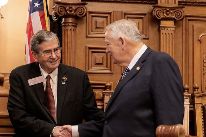 Georgia Rep. Richard Smith shakes hands with the late House Speaker David Ralston.