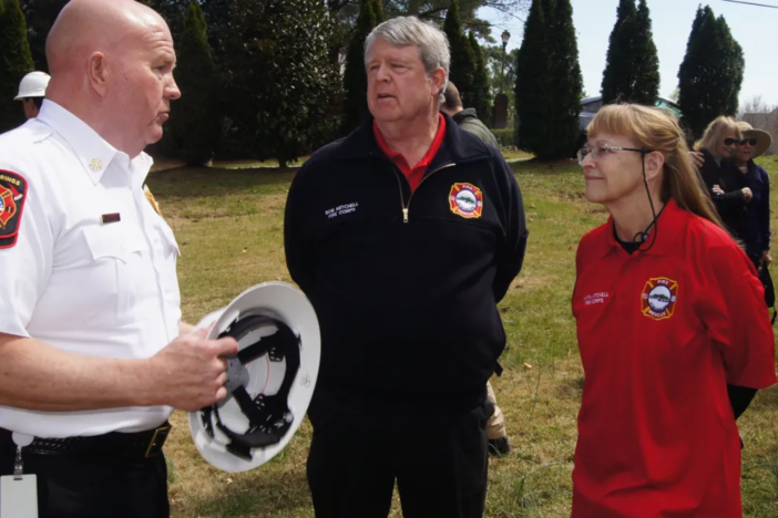 Sandy Springs Fire Chief Keith Sanders, left, said firefighters and their vehicles were being kept out of service by non-emergency service calls.