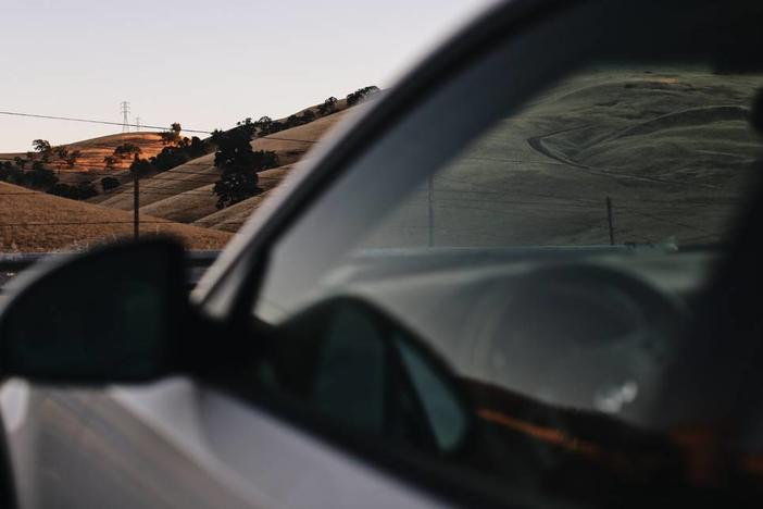 A dark-tinted car window 