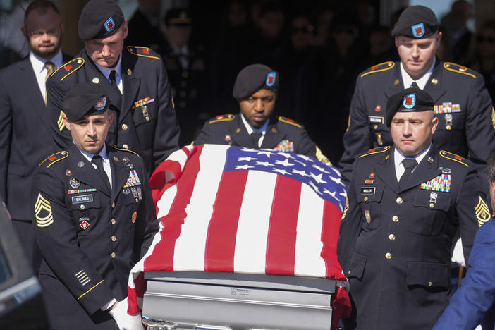 A casket holding the remains of Army Reserve soldier Staff Sgt. William Jerome Rivers is carried from a church after a funeral service Tuesday, Feb. 13, 2024, in Carrollton, Ga. Rivers was one of three Georgia soldiers killed last month in drone attack in Jordan. 
