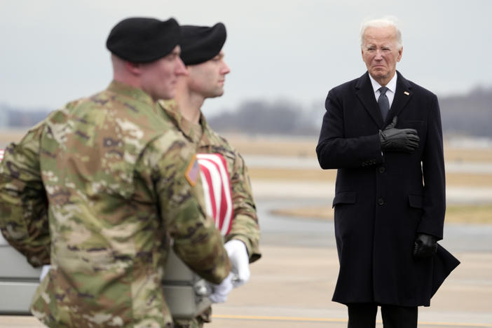 President Joe Biden watches as an Army carry team moves the flag-draped transfer case containing the remains of U.S. Army Sgt. William Jerome Rivers, 46, of Carrollton, Ga., during a casualty return at Dover Air Force Base, Del., Friday, Feb. 2, 2024. Rivers was killed in a drone attack in Jordan on Jan. 28. 