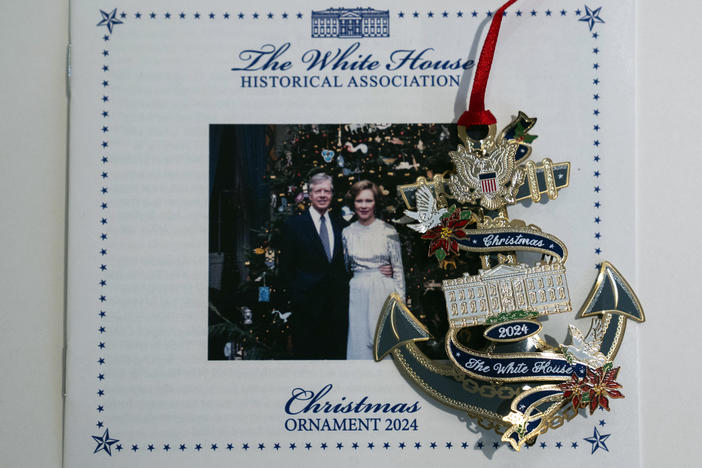 The 2024 White House Christmas Ornament featuring former President Jimmy Carter, is seen at the White House Historical Association Wednesday, Feb. 21, 2024, in Washington. Carter is the first of the U.S. presidents to be honored with an official White House Christmas ornament while still living. (AP Photo/Evan Vucci)