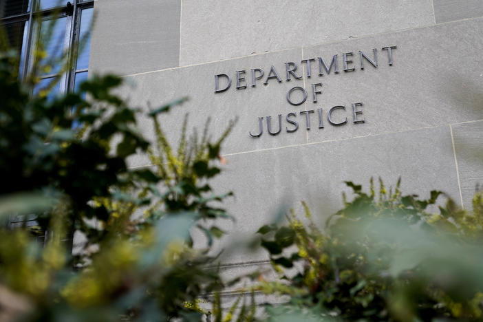 A sign marks an entrance to the Robert F. Kennedy Department of Justice Building in Washington, Jan. 23, 2023. The Justice Department proposed changes Monday, Feb. 5, 2024, to rules governing state-run programs that provide financial assistance to violent crime victims in order to address racial disparities and curb the number of subjective denials of compensation.