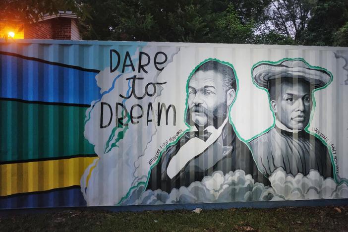 Congressman Jefferson Long, left, and pioneering educator of Black children Lucy Craft Laney, right, are depicted in a mural by artist Kevin Lewis in Macon's Pleasant Hill neighborhood which both at one time called home.