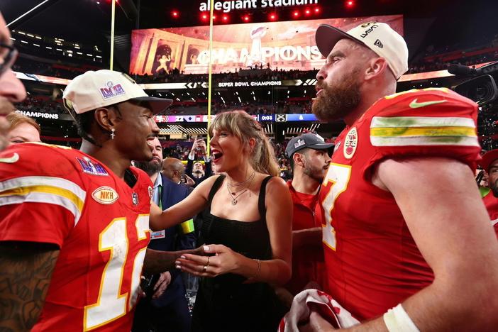 Mecole Hardman with Taylor Swift and Travis Kelce