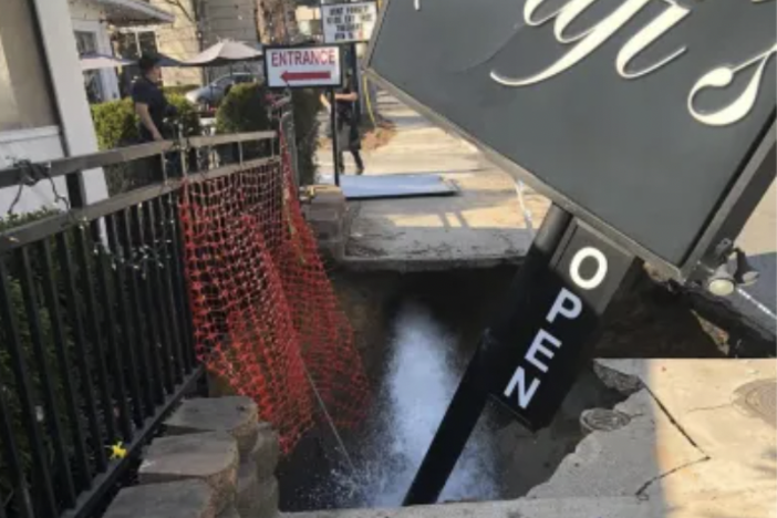 The Sufi’s Kitchen sign in front of the Peachtree Road Persian restaurant collapsed into a sinkhole on Monday. This photo was posted on Facebook by R. Thomas Deluxe Grille, which is located next door. 