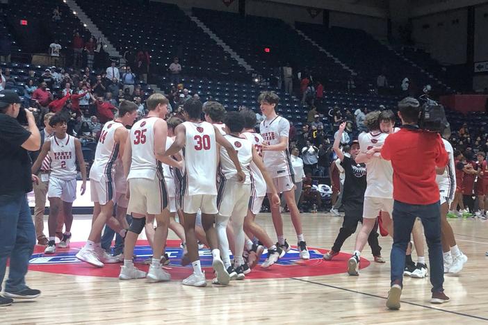 The North Oconee boys celebrate after winning the Class 4A championship, the first in school history.