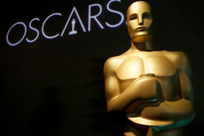 A large reproduction of an Oscar statuette stands at a luncheon in Beverly Hills, Calif. in 2023.