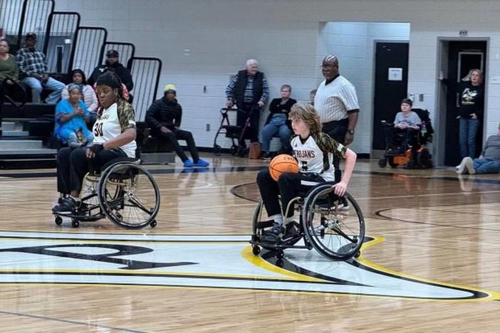 Peach County Rolling Trojans players move down the court during a game earlier this season. Courtesy Peach County School District 