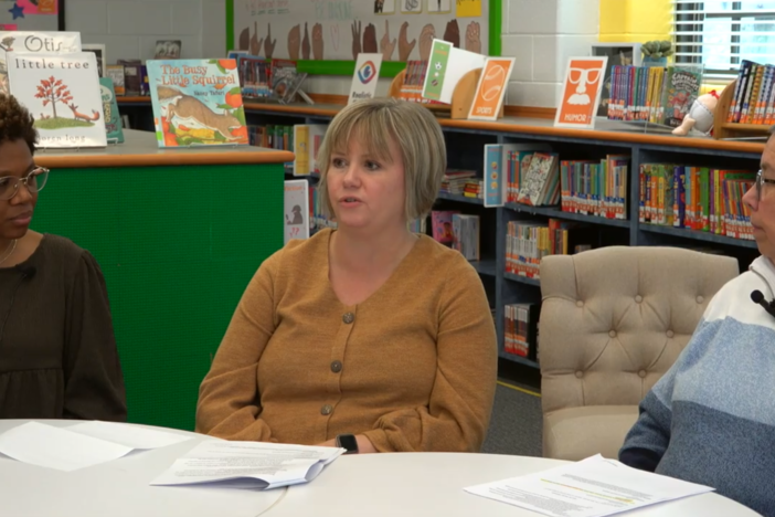three teachers talking