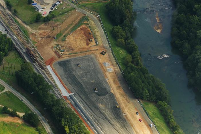 Unlined coal ash landfills at Georgia Power's Plant Arkwright being consolidated into a single lined landfill on the bank of the Ocmulgee River in September of 2023. In addition to the liner, the new impoundment will collect any coal ash leachate for 30 years. 