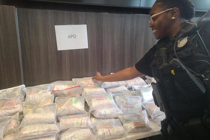Atlanta Police Department Officer Breana Banks drops off a fully assembled kit in the First Responders Kits4Kids program on April 30, 2024.