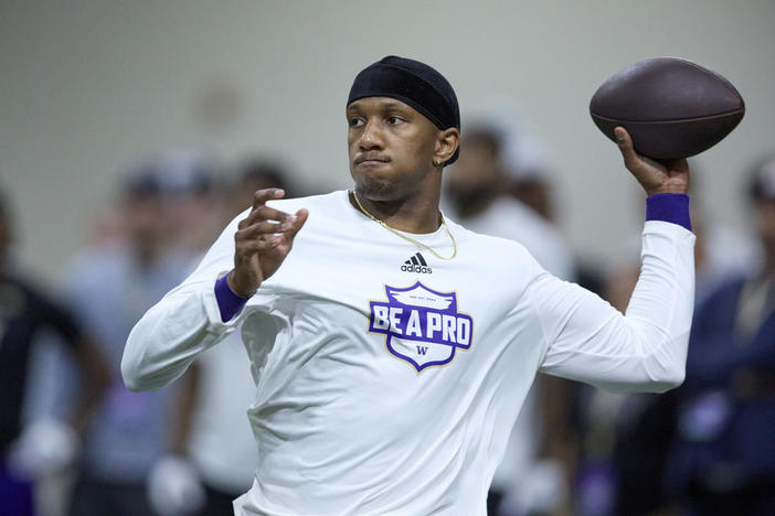 Washington quarterback Michael Penix Jr. passes during the NCAA college's NFL football pro day, Thursday, March 28, 2024, in Seattle. 