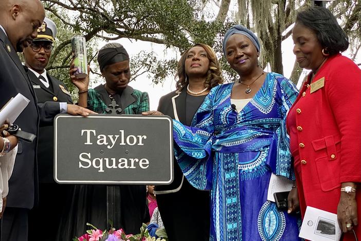 Susie King Taylor Center for Jubilee co-founder Patt Gunn, second from right, poses at Taylor Square in downtown Savannah during a signage unveiling ceremony on Feb. 10, 2024. 