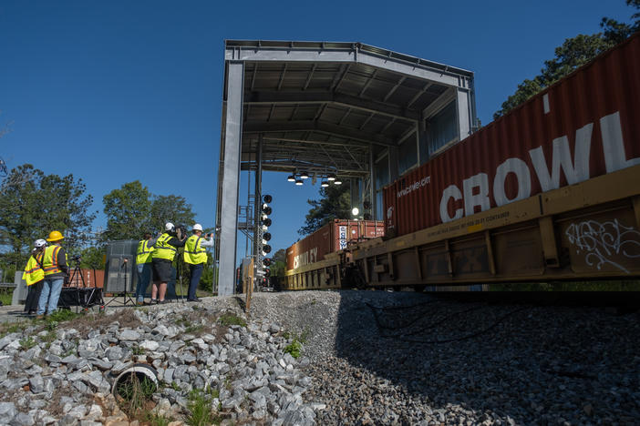 A train passes through Norfolk Southern's third digital train inspection portal in Jackson, Georgia. About 19 trains pass through here in a day.
