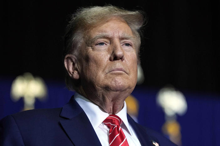 Republican presidential candidate former President Donald Trump speaks at a campaign rally, March 9, 2024, in Rome Ga. Lawyers for former President Donald Trump argued in a court filing that the charges against him in the Georgia election interference case seek to criminalize political speech and advocacy conduct that is protected by the First Amendment. 