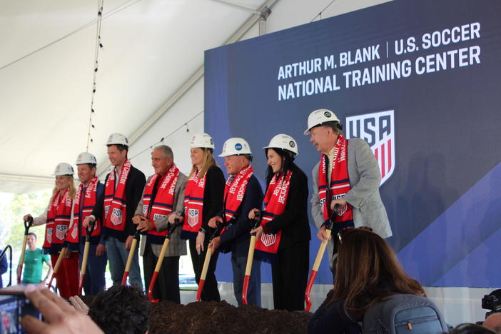 Gov. Brian Kemp and Marty Kemp (left), Arthur Blank (fourth from left) and executives from U.S. Soccer break ground on the organization's new National Training Center in Fayette County, Ga., on April 8, 2024. 