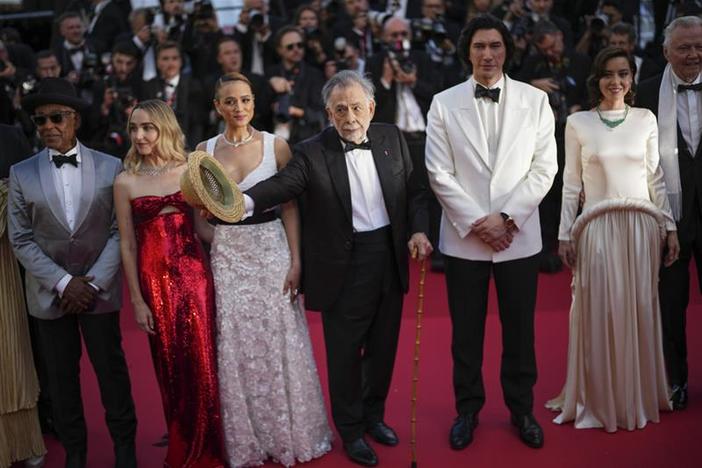 Adam Driver, Aubrey Plaza and Jon Voight pose for photographers upon arrival at the premiere of the film 'Megalopolis' at the 77th international film festival, Cannes, southern France, Thursday, May 16, 2024. (Photo by Daniel Cole/Invision/AP)