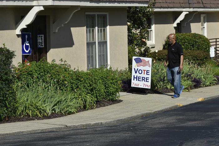 A voter walks into Holy Trinity Lutheran Church in Cobb County Tuesday on the last day to vote in the primary election.