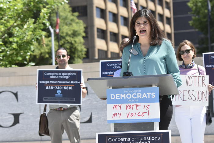 Rep. Saira Draper speaks at a press conference raising concerns about potential mass voter challenges.