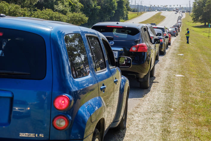 The line to get into the food distribution was about 2 miles long once the whole circuit was completed. Some people waited in the line upwards of two hours for boxes with items like corn, potatoes and peaches. 