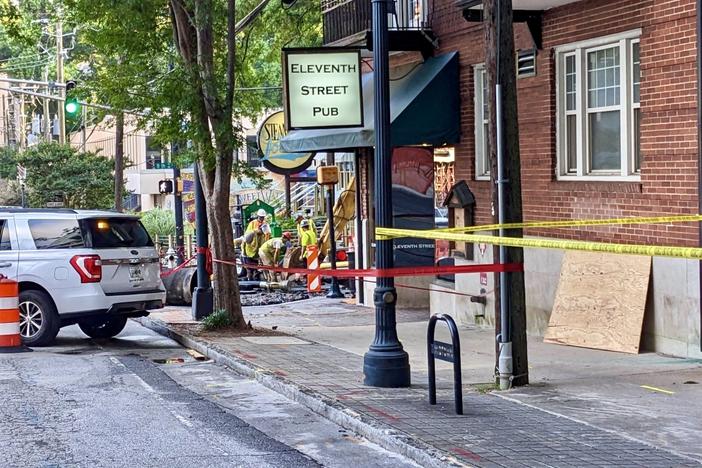 Crews working to repair the 11th Street water main break at 7:30 a.m. Monday, June 3. (Photo by Beth McKibben)