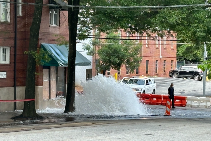 Water gushing from a broken water main at 11th and West Peachtree in Midtown on Sunday morning, June 2. (Photo by Beth McKibben)