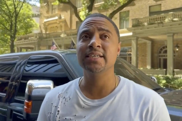 In this image taken from video, Joseph Grier speaks with reporters about a shooting in the food court of the Peachtree Center development in downtown Atlanta, Tuesday, June 11, 2024. (AP Photo)