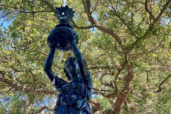 The fountain features a sculpture representing Flora, the goddess of flowers and flowering plants.