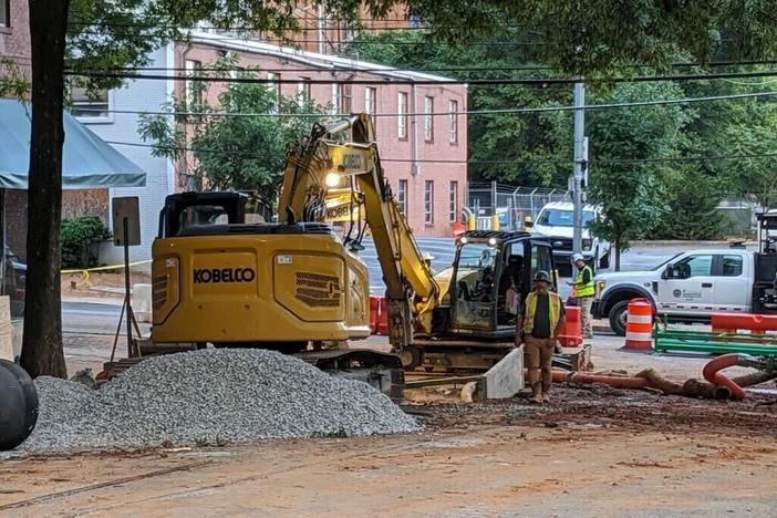 Repairs to a major water main in Midtown at 11th and West Peachtree streets were still underway on Tuesday morning, June 4. (Photo by Beth McKibben)