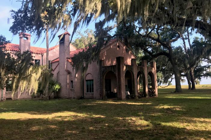 The 1924 Spanish Revival style Torrey-West Home on Ossabaw Island is shown in this view from its side.