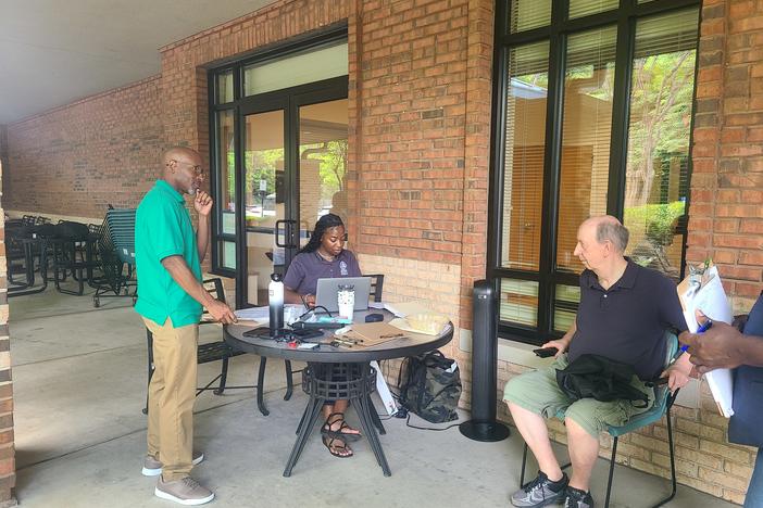 Fulton County Nutrition Services employees work to check in eligible seniors at their farmers' market event July 9. 2024.