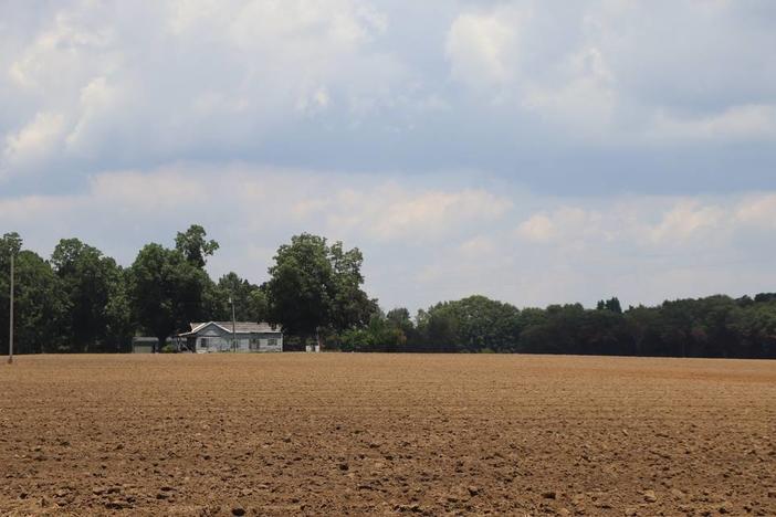 Dry soil stretches far on tilled farm in Americus, Georgia, in this June file photo. Farms and small businesses in Georgia are getting grant money to implement climate-friendly energy technology. Dry soil streches far on tilled farm in Americus, Georgia. Americus is expected to reach hot temperatures this weekend that are made three to four times as likely by climate change. (Courtesy of Ledger-Enquirer)