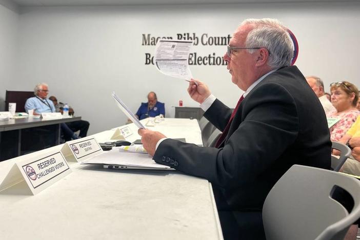 David Sumrall, chair of the Bibb County Republican Party, presented a spreadsheet and some voter registration records to the county elections board on Monday, July 2, 2024. He accused hundreds of voters of fraud. Jesse Fraga/The Telegraph