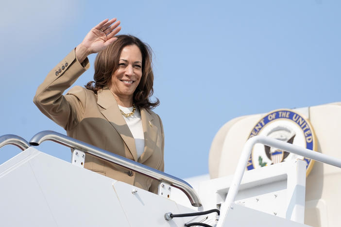 Vice President Kamala Harris waves while boarding Air Force Two as she departs Westfield-Barnes Regional Airport in Westfield, Mass., Saturday, July 27, 2024.