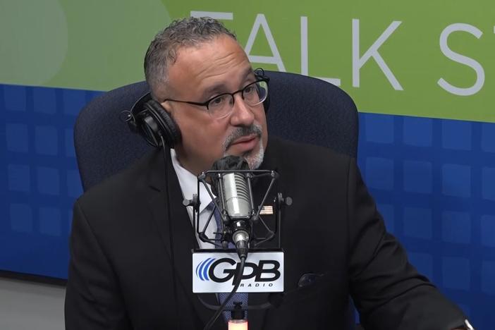 U.S. Secretary of Education Miguel Cardona speaks with GPB's Peter Biello at GPB's Atlanta studios on July 17, 2024.