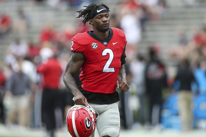 Georgia linebacker Smael Mondon Jr. (2) runs off the field before Georgia's spring NCAA college football game, Saturday, April 16, 2022, in Athens, Ga. Georgia starting linebacker Smael Mondon was arrested by Athens-Clarke County police on Wednesday night, July 10, 2024, on charges of speeding and reckless driving, according to jail records.