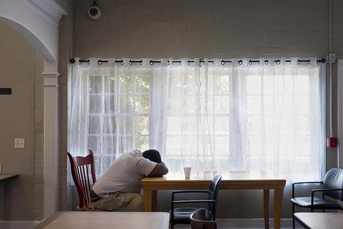 A man experiencing homelessness in Brunswick uses The Well as a place to safely rest and escape the heat in summer 2023. Credit: Justin Taylor/The Current