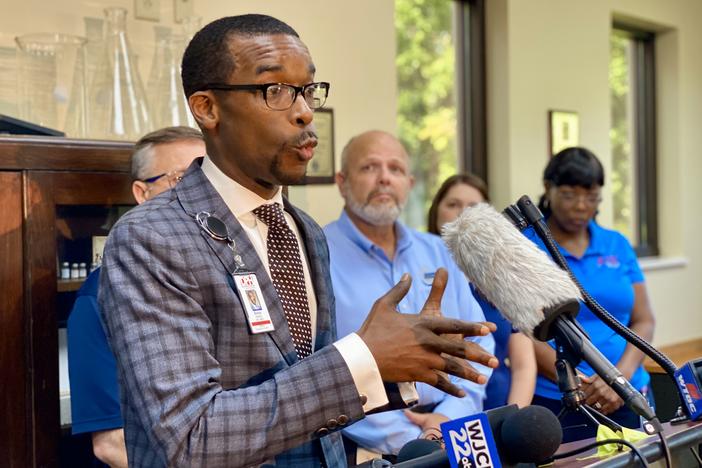 Coastal Health District director Dr. Bonzo Reddick speaks at a news conference at the Chatham County Health Department in Savannah on Friday about public health risks in the wake of Tropical Storm Debby.