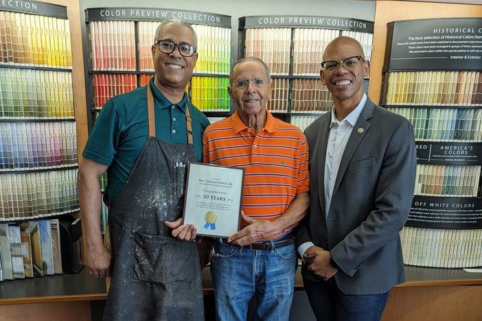 Atlanta City Councilmember Jason Dozier met with the Portis family to celebrate 50 years of their family business operating in Atlanta's West End Neighborhood.