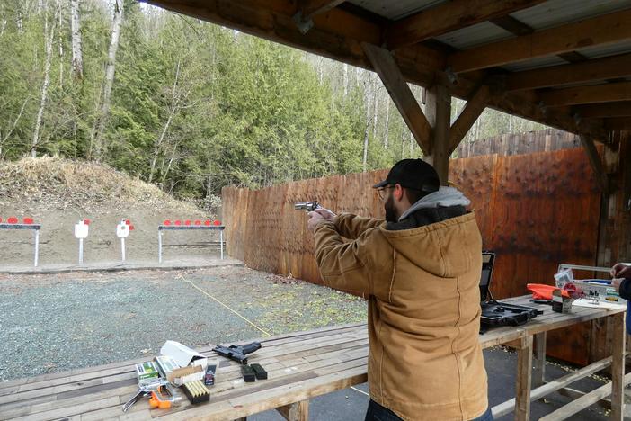 A man at a shooting range. (Pexels)
