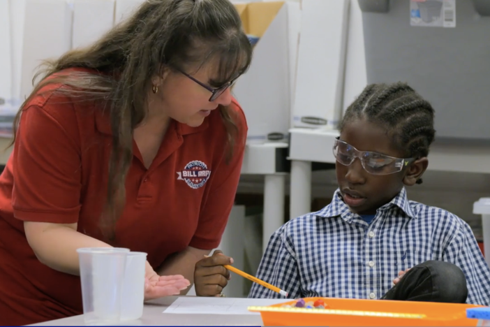 Teacher discusses Crosscutting Concepts with her student