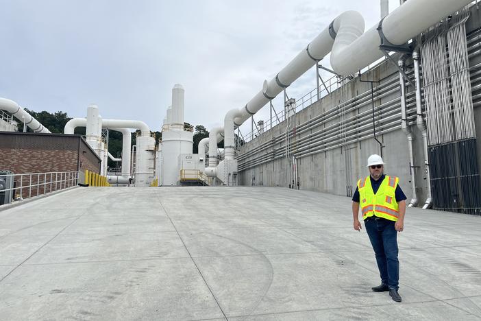 Fulton County Director of Public Works David Clark stand in front of the upgraded water treatment plant at Big Creek Water Reclamation Facility on September 6, 2024.
