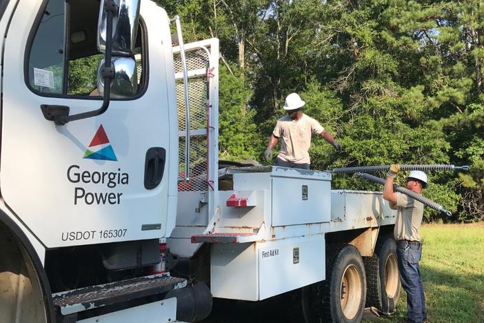 Georgia Power employees on truck. (Georgia Power/Facebook)