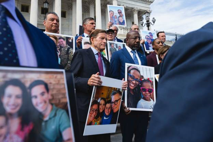 Sen. Raphael Warnock joined U.S. Senate Democratic colleges on the steps of the U.S. Capitol to display families and individuals that have benefited from IVF treatment. Courtesy of Sen. Raphael Warnock